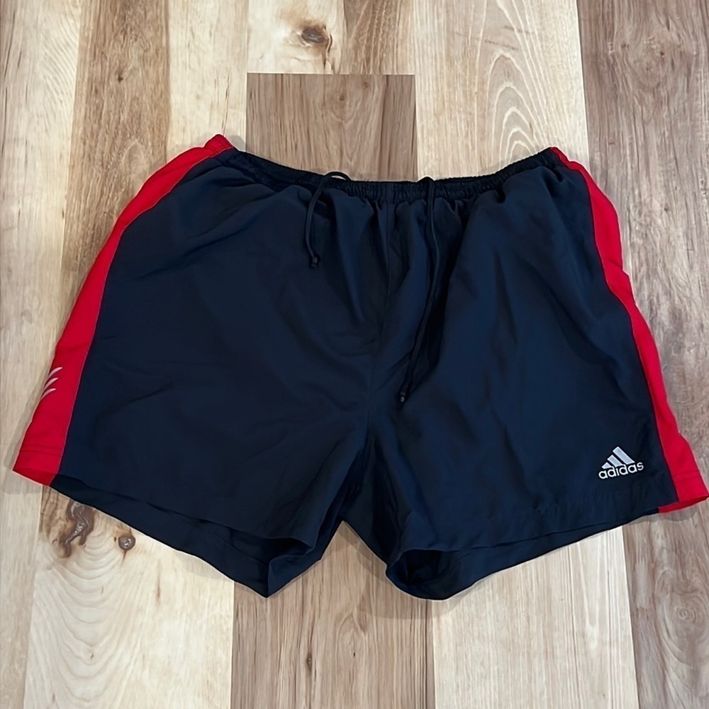 Adidas swim trunks. Like new size large red/black
